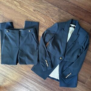 Veronica Beard navy suit with gold buttons